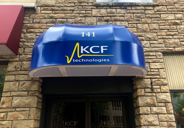State College - KCF Technologies office blue awning