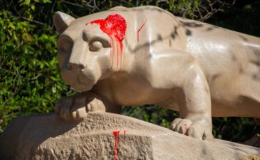 Penn State Alumna Charged with Vandalizing Nittany Lion Shrine During Commencement Weekend