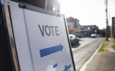 A sign showing people where they should cast their ballots for an election.