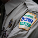 A Pennsylvania Department of Conservation and Natural Resources State Parks patch on a shirt