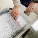 Mail ballots are sorted and counted by workers on Election Day in Northampton County.