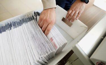 Mail ballots are sorted and counted by workers on Election Day in Northampton County.