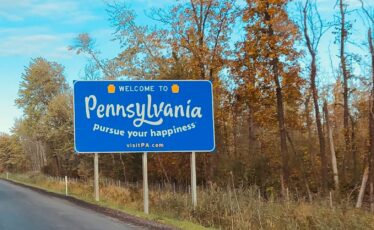 Welcome to Pennsylvania, Pursue your happiness sign