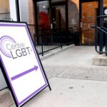 Purple and white centre lgbt+ sign