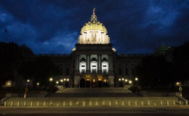 The south side of the Pennsylvania State Capitol Complex at night.