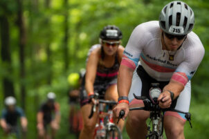 2024 Ironman 70.3 Pennsylvania Happy Valley competitors bicycle on Hubler Ridge Road in Marion Township. Photo by Greg Guise