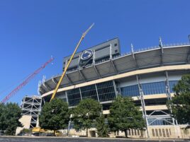 State College - Beaver Stadium story cranes lead art