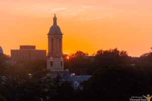 State College - summer sunset old main onwardstate
