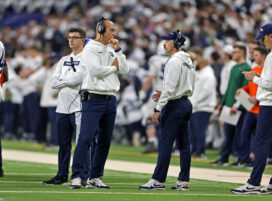 James Franklin and Penn State's special teams coordinator Justin Lustig chat at the Big Ten Championship on Dec. 7, 2024.