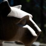 Close up of the Penn State's Nittany Lion Shrine statue in profile