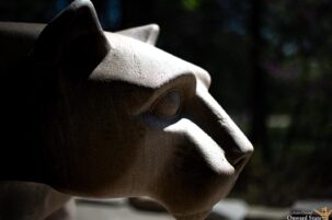 Close up of the Penn State's Nittany Lion Shrine statue in profile