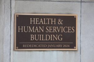 A placard outside the Pennsylvania Health & Human Services building in Harrisburg.