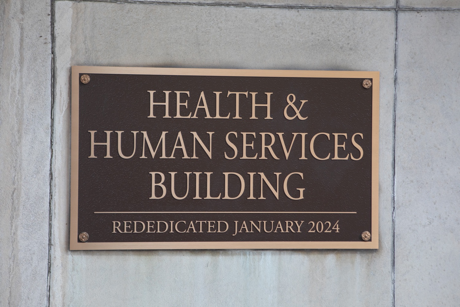 A placard outside the Pennsylvania Health & Human Services building in Harrisburg.