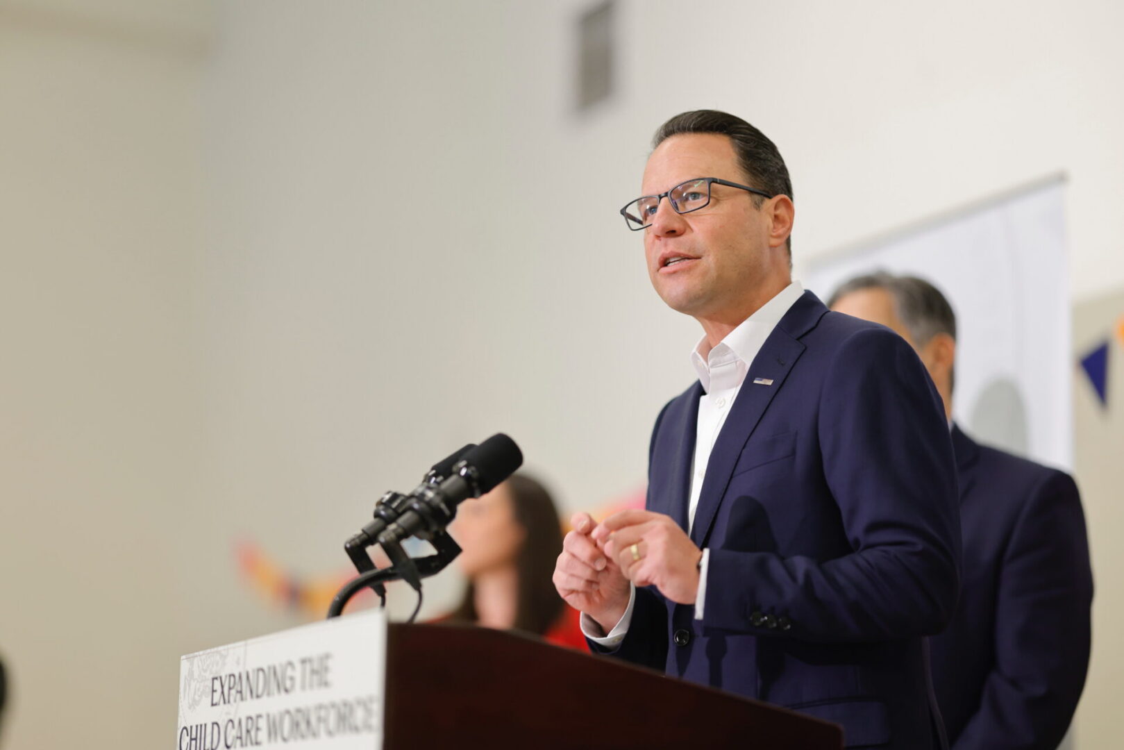 Gov. Josh Shapiro speaks at a news conference, highlighting child care recruitment and retention bonuses that were passed as part of the 2025-26 state budget.