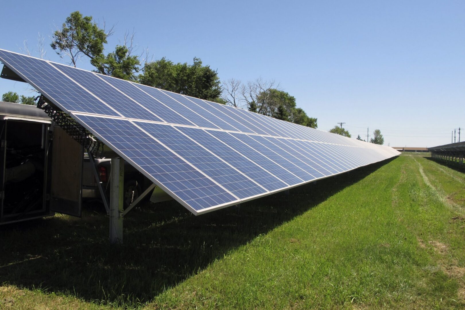 An array of solar panels glisten in the sun outside Cannon Ball, N.D., located on the north side of the Standing Rock Indian Reservation, where the grand opening for the project was held on Friday, July 26, 2019. The project was motivated in part by the controversial Dakota Access pipeline that was built over the objections of Native American leaders and others. The project cost $470,000, all covered by nonprofits and private entities
