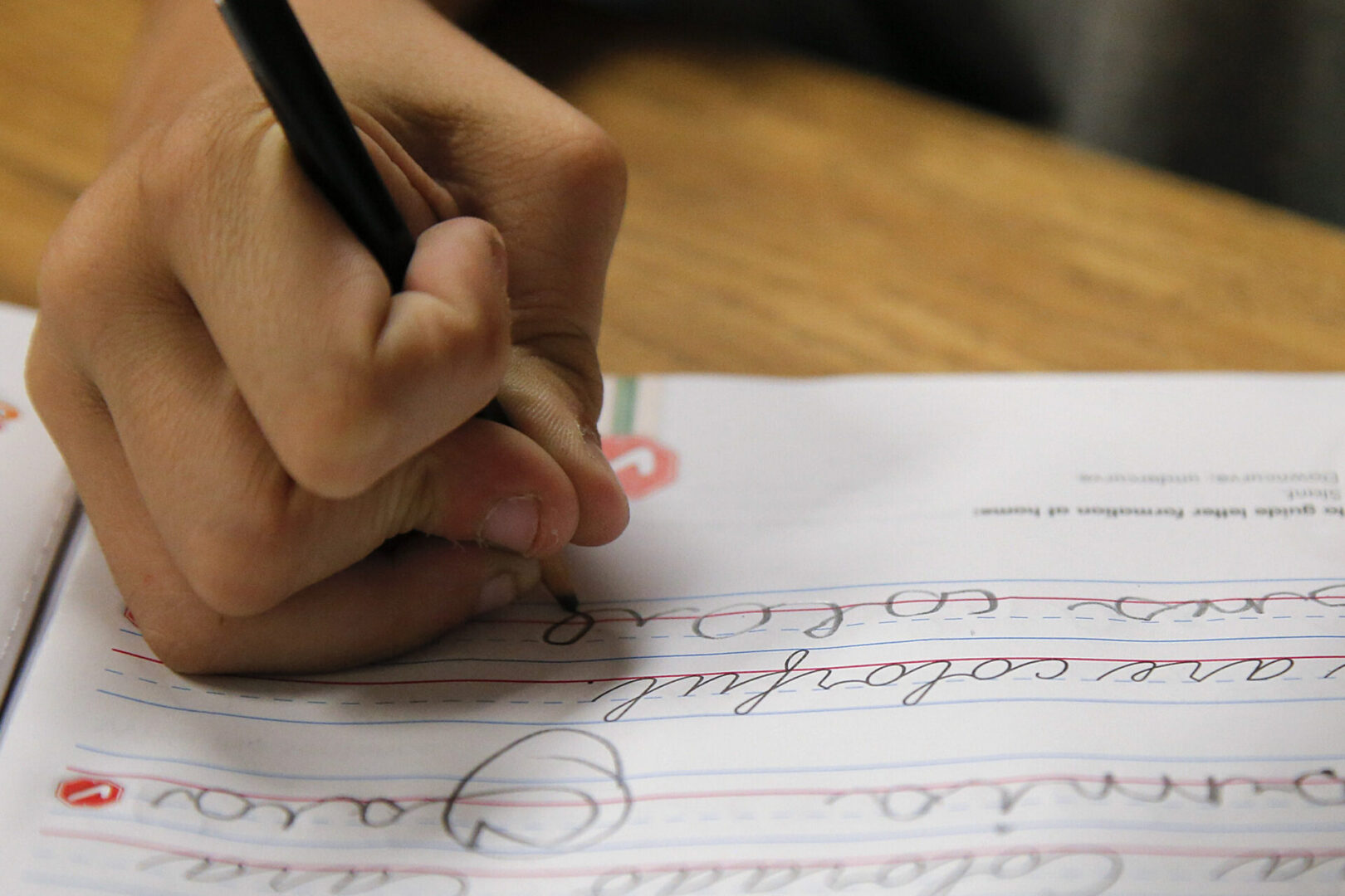 A student practices writing in cursive at St. Marks Lutheran School in Hacienda Heights, Calif., Thursday, Oct. 18, 2012. Bucking a growing trend of eliminating cursive from elementary school curriculums or making it optional, California is among the states keeping longhand as a third-grade staple.
