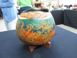 A dried gourd decorated with underwater scenery.