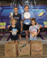 VBS STUDENTS CREATE BIRTHDAY BAGS
